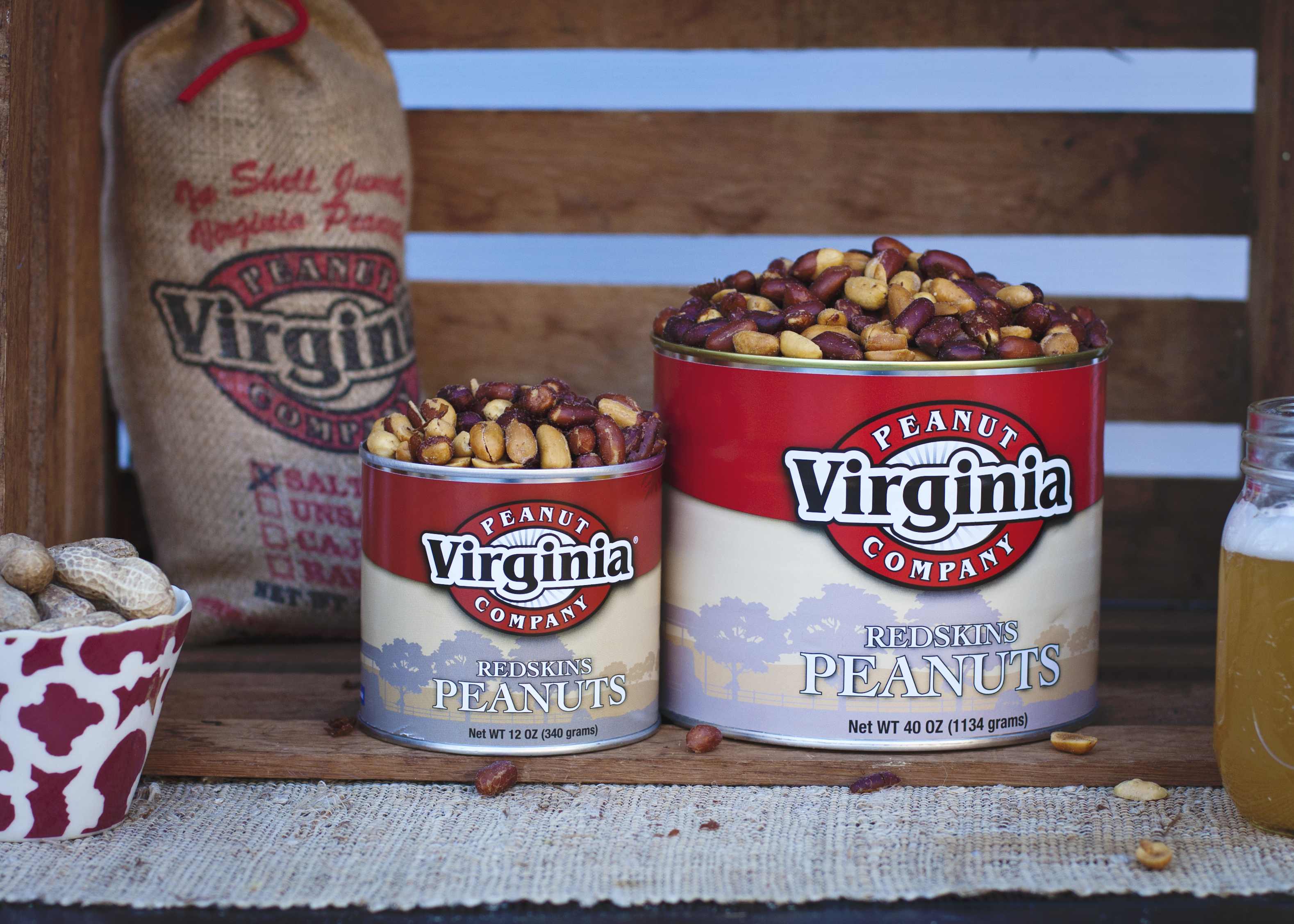 Cans of opened jumbo redskin peanuts